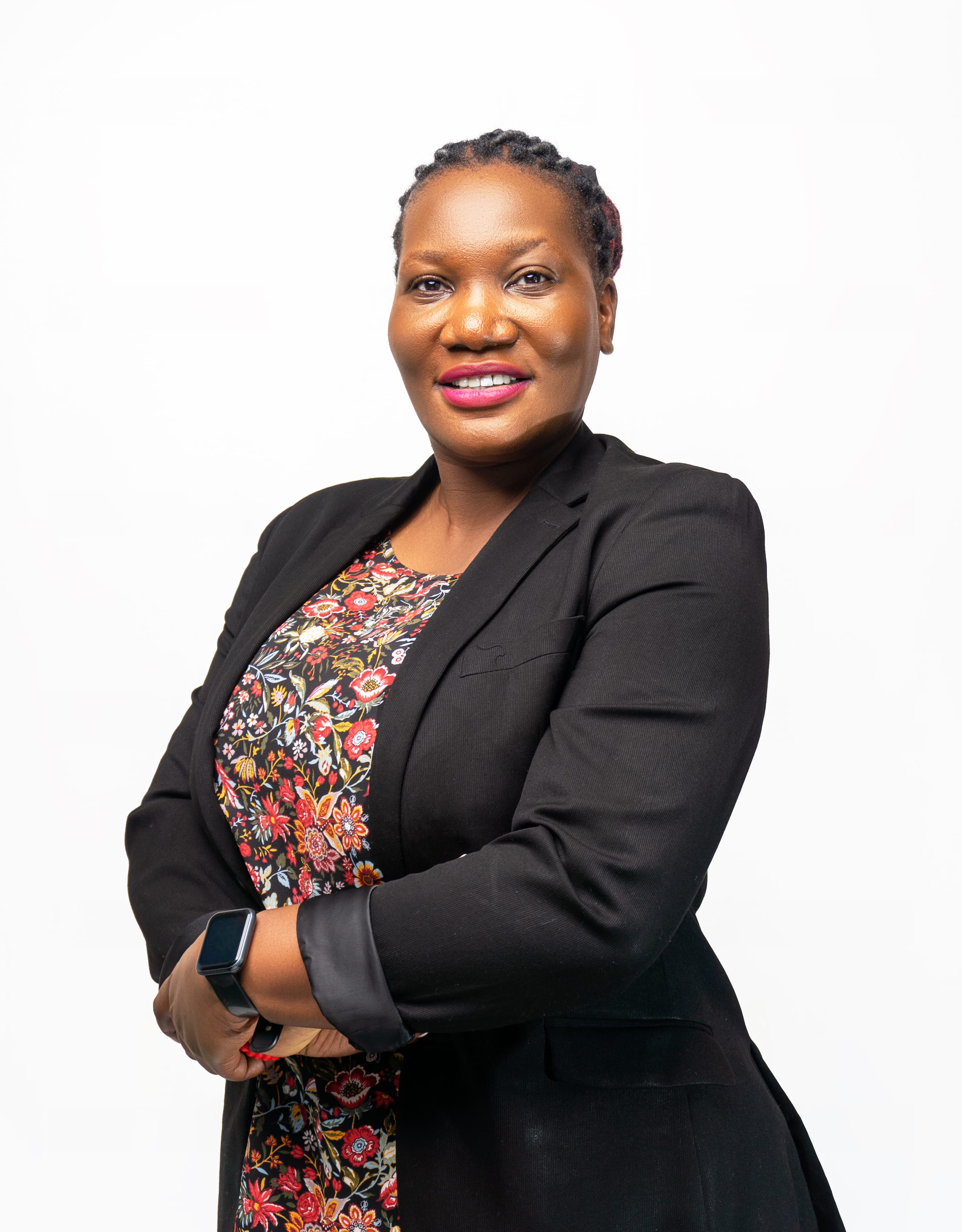 A professional and confident person posing for a headshot.